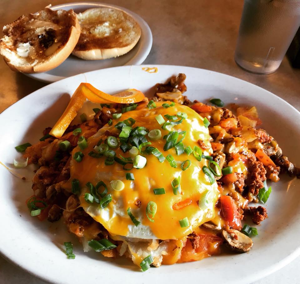 Wally's "Country" Oldie: Chorizo, mushrooms, tomatoes and home fries topped with 2 eggs and melted cheese